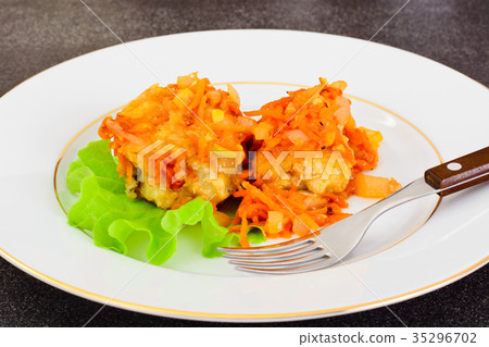 Fish in Greek with Onion and Carrot 35296702