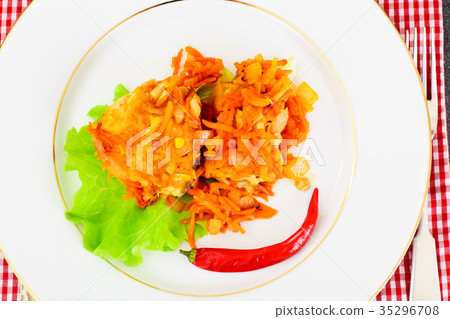 Fish in Greek with Onion and Carrot 35296708
