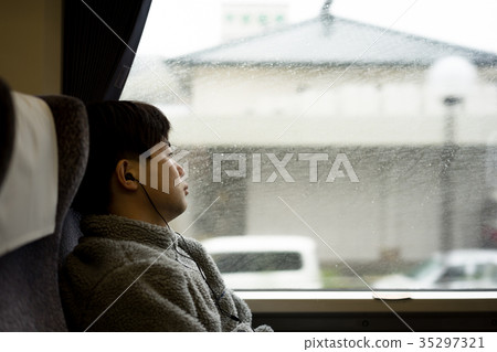 Men looking out of the car window 35297321