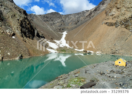Blue lake in Aktru valley. Altai Republic, Russia Blue lake in Aktru valley. Altai Republic, Russia 35299376