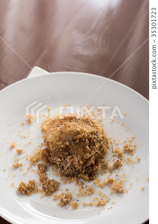 Plum dumplings on the white plate with fork Plum dumplings on the white plate with fork 35301723
