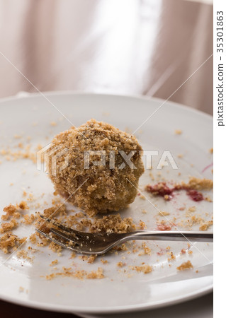 Plum dumplings on the white round plate 35301863