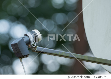 View of a satellite dish with a cable 35303930