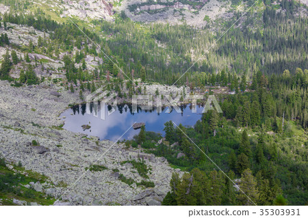 Fantastic sunny day is in mountain lake. Creative 35303931