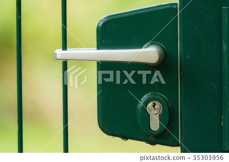 Lock and latch of a gated door 35303956