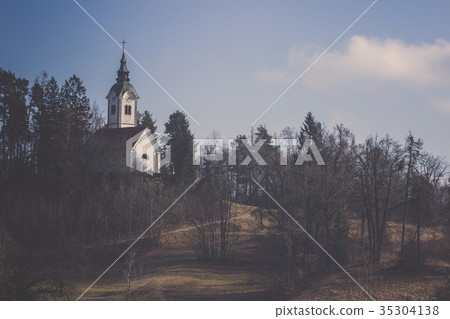 Church on hill in middle forest of Bled, Slovenia. Church on hill in middle forest of Bled, Slovenia. 35304138