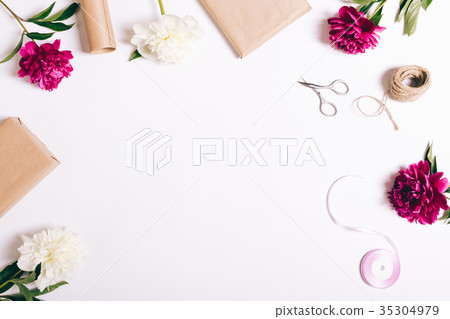 Festive composition of flowers and gifts Festive composition of flowers and gifts 35304979