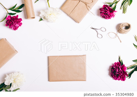 Festive packing of a book for a gift Festive packing of a book for a gift 35304980