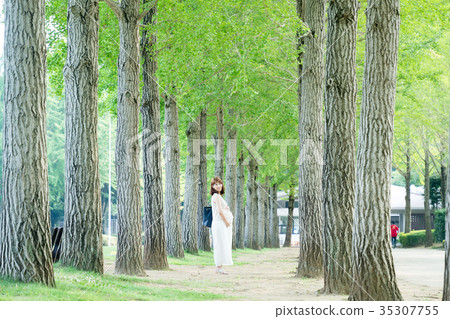 Park walk of late pregnancy woman Park walk of late pregnancy woman 35307755