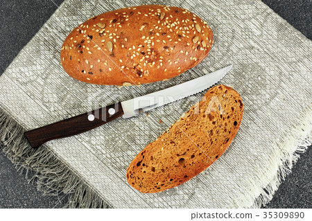 Fresh Tasty Bread on Dark Background 35309890