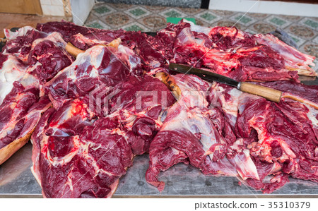 Dog meat sliced local food 35310379