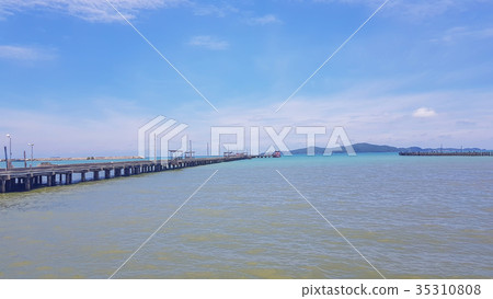 soft focus of The pier transports to the island. soft focus of The pier transports to the island. 35310808
