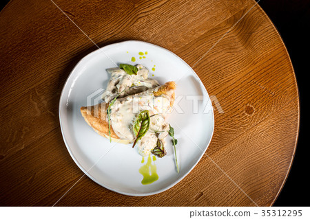 closeup of a plate with a typical tortilla de 35312295