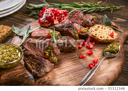 Meat steak with green pesto Meat steak with green pesto 35312346