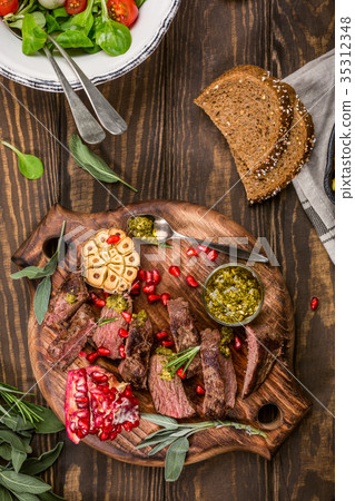Meat steak with green pesto Meat steak with green pesto 35312348