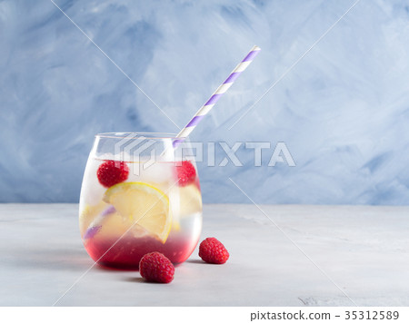 Drink with raspberries and lemon, ice Drink with raspberries and lemon, ice 35312589