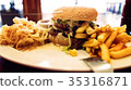 Unhealthy meal with mexican nacho chips, beef 35316871