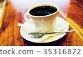 Black coffee in white cup on the brown wooden 35316872