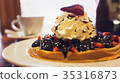 Delicious homemade waffle desert with fruits and 35316873