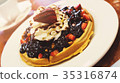 Delicious homemade waffle desert with fruits and 35316874