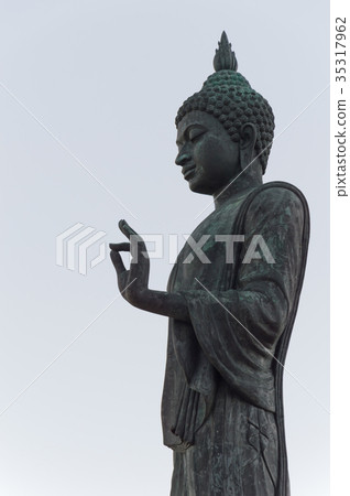 Buddha image in walking posture, Thailand 35317962