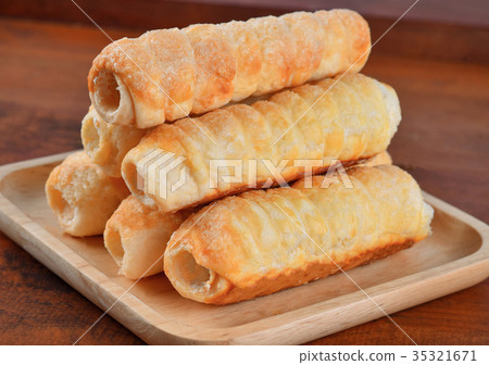 bread & cake on wood 35321671