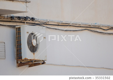 Old rusty air conditioning in Spain Old rusty air conditioning in Spain 35331502