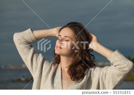 Portrait of Beautiful Woman Outdoors 35331831