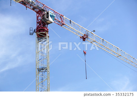 Part of a construction tower crane against the Part of a construction tower crane against the 35332175