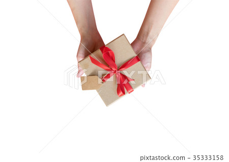 Close up hand woman holding gift box on isolated Close up hand woman holding gift box on isolated 35333158