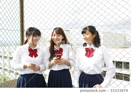 Girl students gather on the roof Girl students gather on the roof 35333874