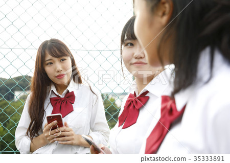 Girl students gather on the roof Girl students gather on the roof 35333891