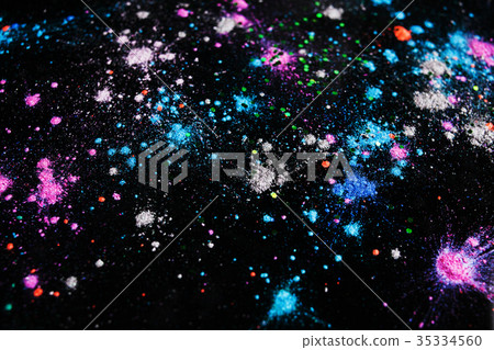 Festive colorful powdery splashes top view 35334560