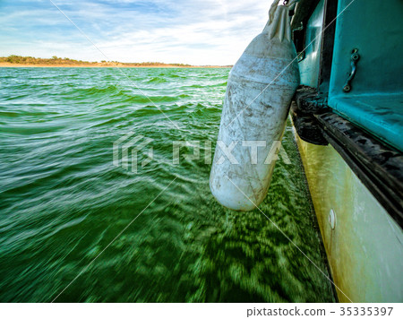 View of Green Ocean Waves from Boat Board 35335397