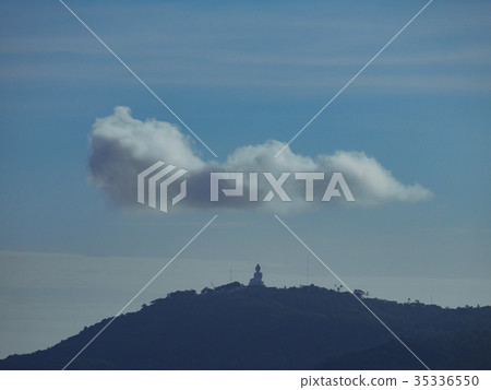 cloudy blue sky background , big buddha statue  35336550