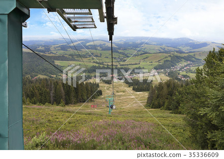 The support of the mountain lift rises above 35336609