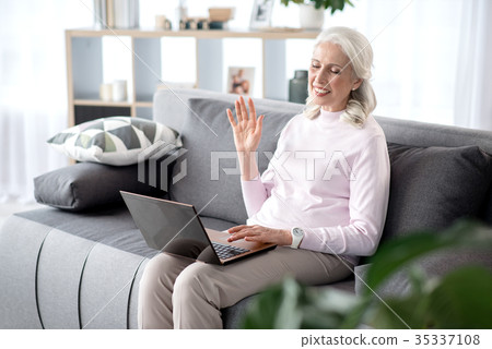 Glad mature lady speaking with someone through Glad mature lady speaking with someone through 35337108
