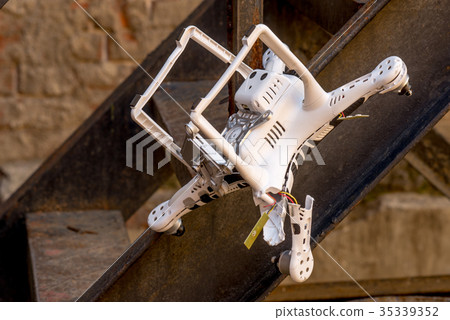 Crashed drone that stuck on the ladder Crashed drone that stuck on the ladder 35339352