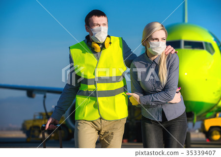 Sick passenger at an airport 35339407