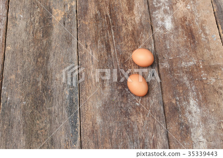 egg on wood background. Top view egg on wood background. Top view 35339443