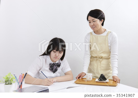 Examination student Mother and daughter Examination student Mother and daughter 35341907