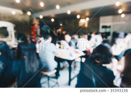 Blurred bokeh of restaurant with people background Blurred bokeh of restaurant with people background 35343156