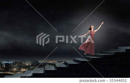 Woman running on stairs Woman running on stairs 35344052