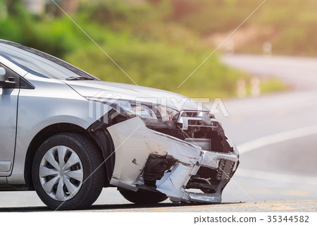 Silver car get damaged by crash accident on the road. Car repair or car insurance concept 35344582