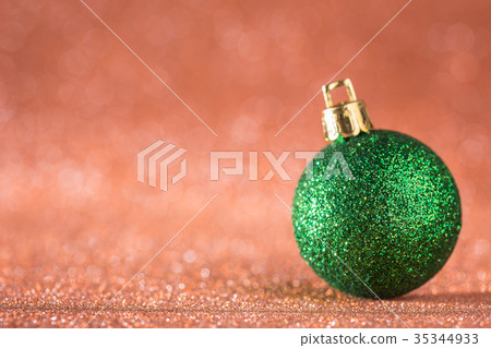 Christmas and New Year Background. Shiny Christmas Ball on Red Holiday and New Year Abstract Blurred Defocused Background Christmas and New Year Background. Shiny Christmas Ball on Red Holiday and New Year Abstract Blurred Defocused Background 35344933