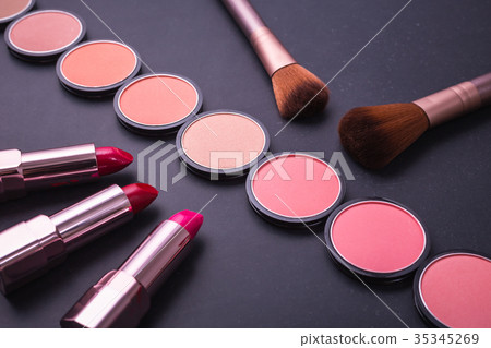 Set of decorative cosmetics and soft brush on stone Set of decorative cosmetics and soft brush on stone 35345269