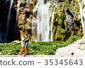 Couple near the Waterfall in Croatia 35345643