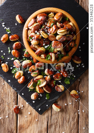 crispy deep fried salted broad beans in a bowl crispy deep fried salted broad beans in a bowl 35346228