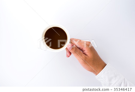 Coffee cup in hand on a white background Coffee cup in hand on a white background 35346417