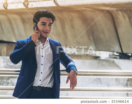 Business man using smartphone Business man using smartphone 35346614